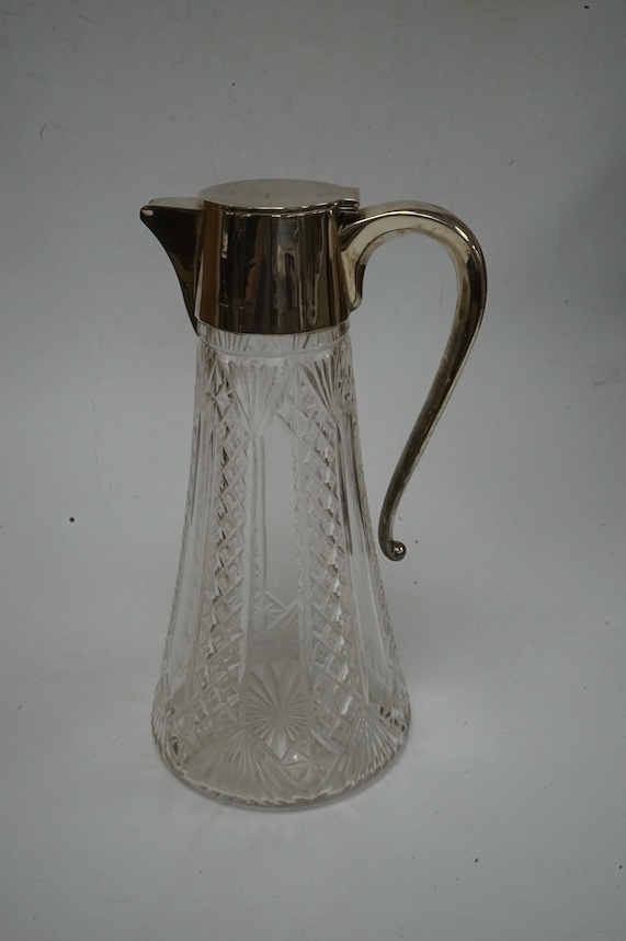 A George V silver mounted cut glass claret jug, Birmingham, 1911, height 25.3cm, Condition - poor to fair